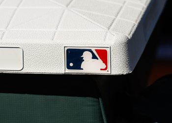 SCOTTSDALE, AZ - FEBRUARY 22: The MLB logo on a base before the MLB Spring Training baseball game between the Arizona Diamondbacks and the Colorado Rockies on February 22, 2025 at Salt River Fields at Talking Stick in Scottsdale, Arizona. (Photo by Kevin Abele/Icon Sportswire)